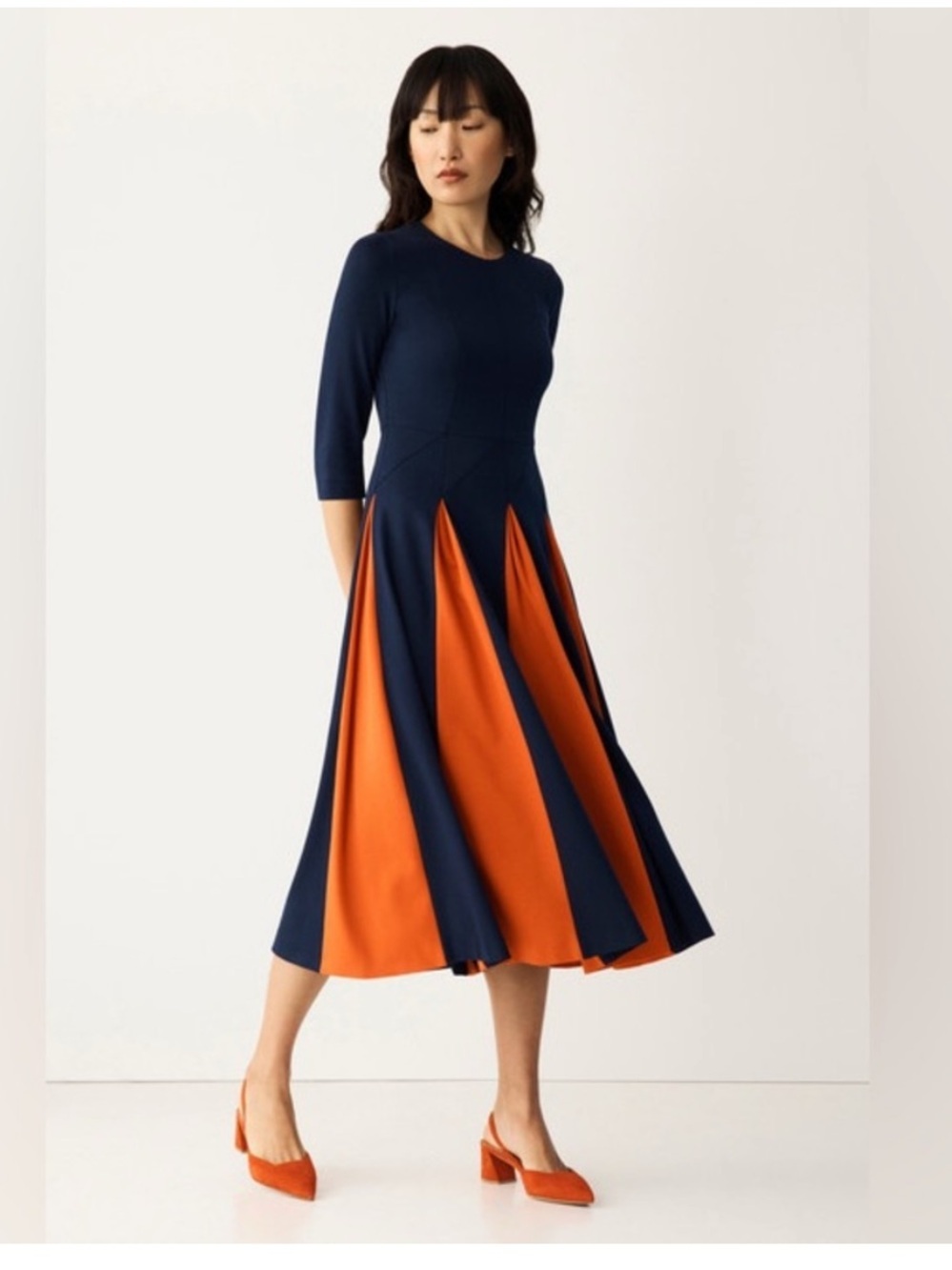 The Fold London Zenora Navy and Burnt Orange Pleated Midi Skirt Dress